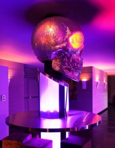 Extravagant mosaic skull with lighting in a disco